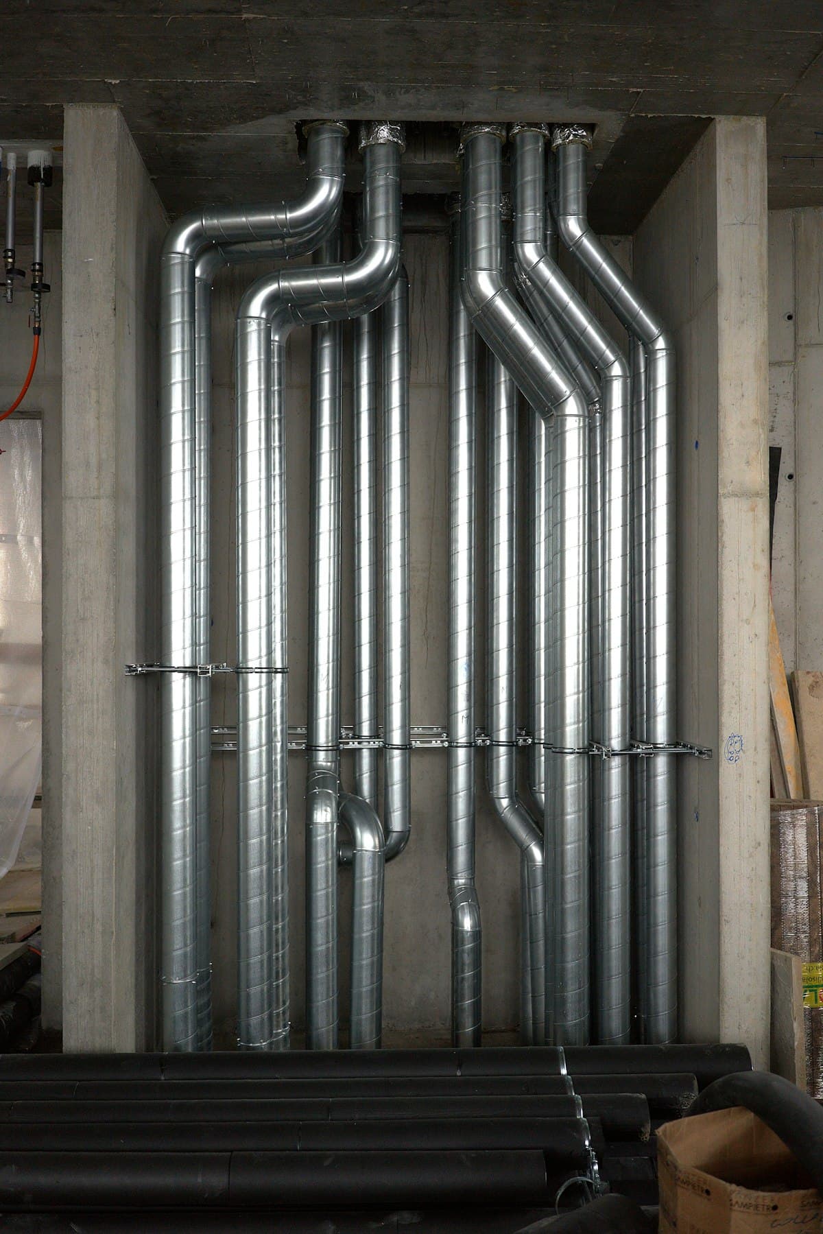 Mechanical piping rising through a plant